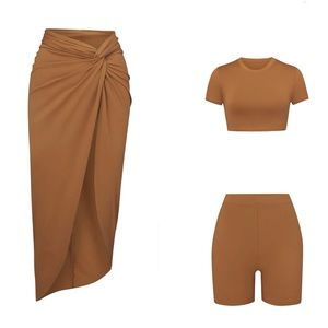 SKIMS SWIM ALMOND BUNDLE  SHORTS  SHORT SLEEVED SHIRT  SARONG  S M